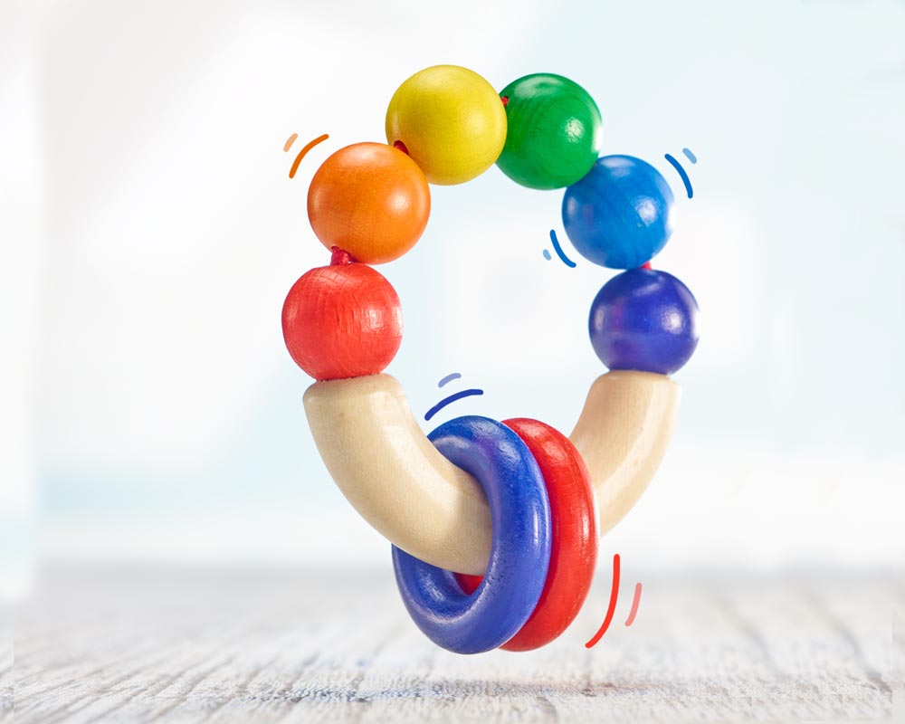 wooden grabbing toy rainbow colours