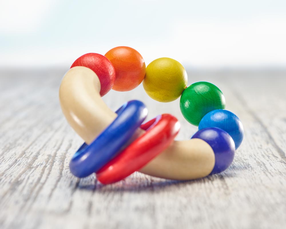 wooden grabbing toy rainbow colours