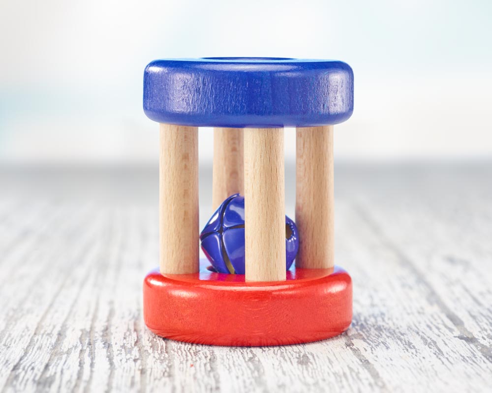 wooden roller grabbing toy with bells