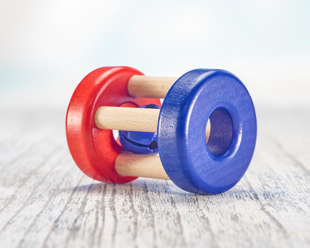 wooden roller grabbing toy with bells