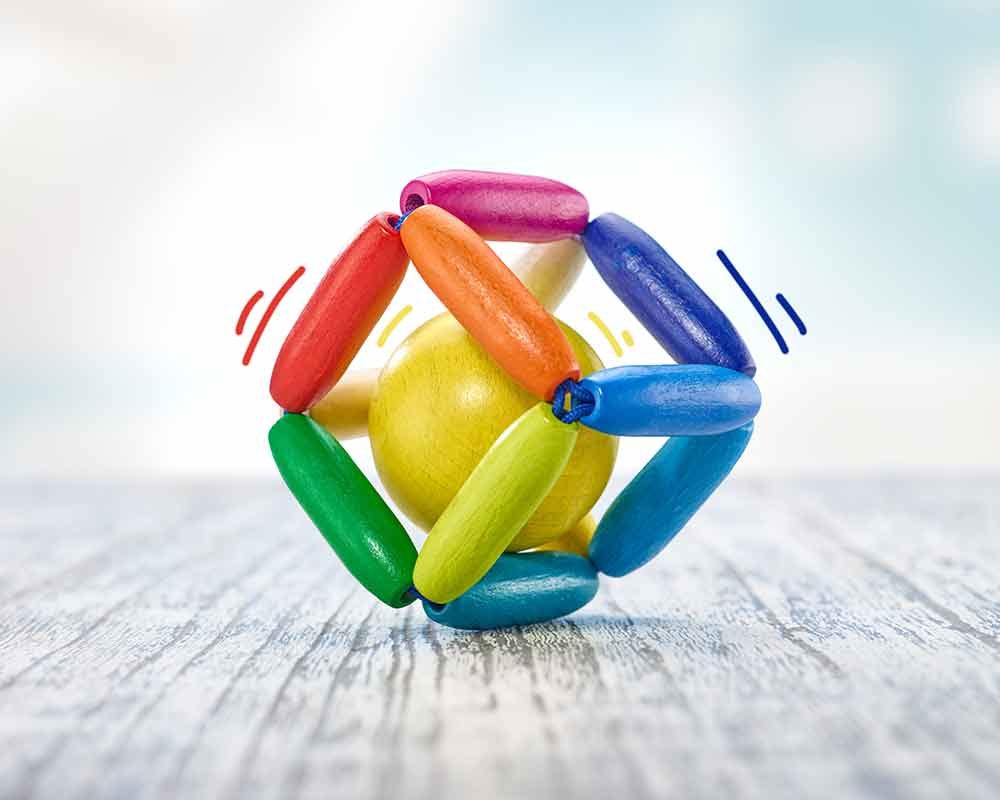 wooden collapsing cube with ball