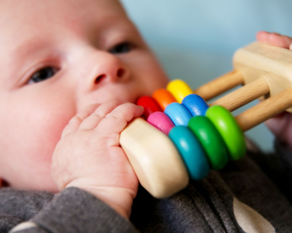 Baby with abacus wooden toy by selecta