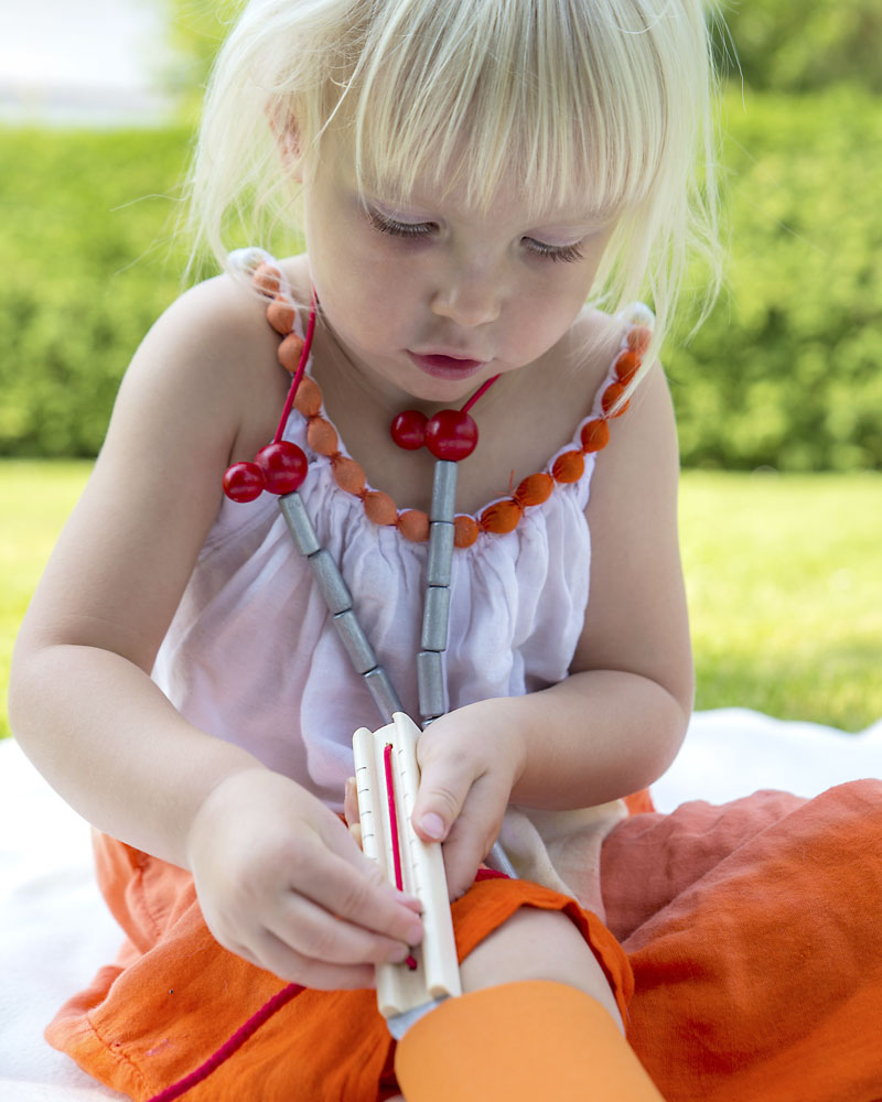 Child with doctors carrying case wooden toy by Selecta