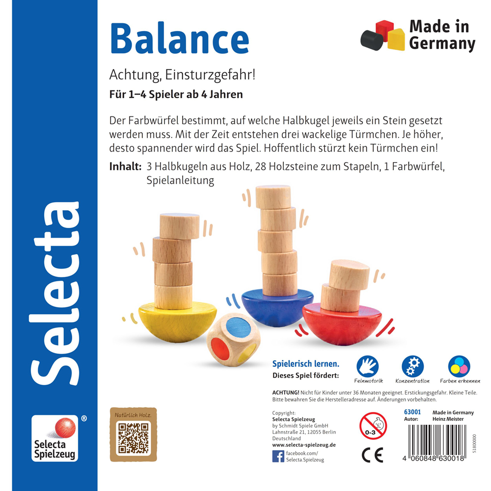 Three wooden semicircles balance upright, forming a tower on a wobbly half-sphere with discs and a die.
